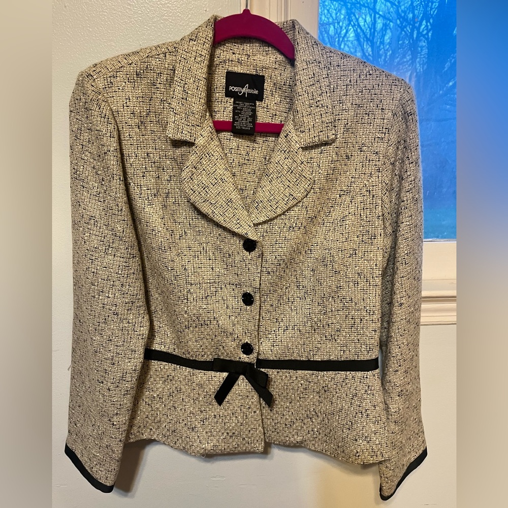 Ladies jacket beautiful black satin detail around waist and arms. Shoulder pad